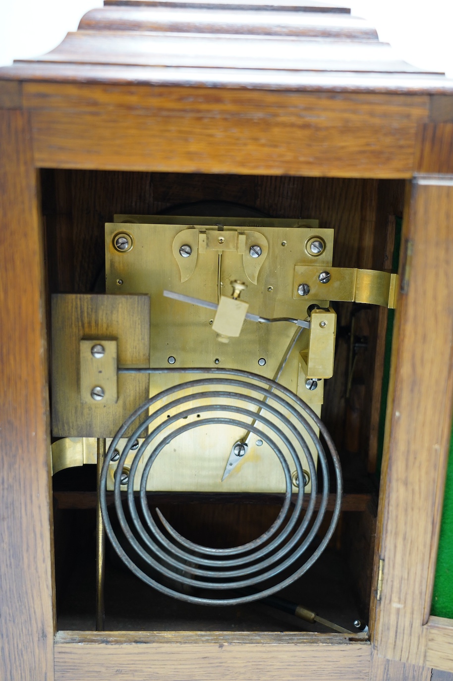 A mid 19th century oak eight day mantel clock, signed J. Jennens, Skinner St. London, pendulum, no key. 45cm. Condition - fair to good, a little faded in areas. Not tested as working